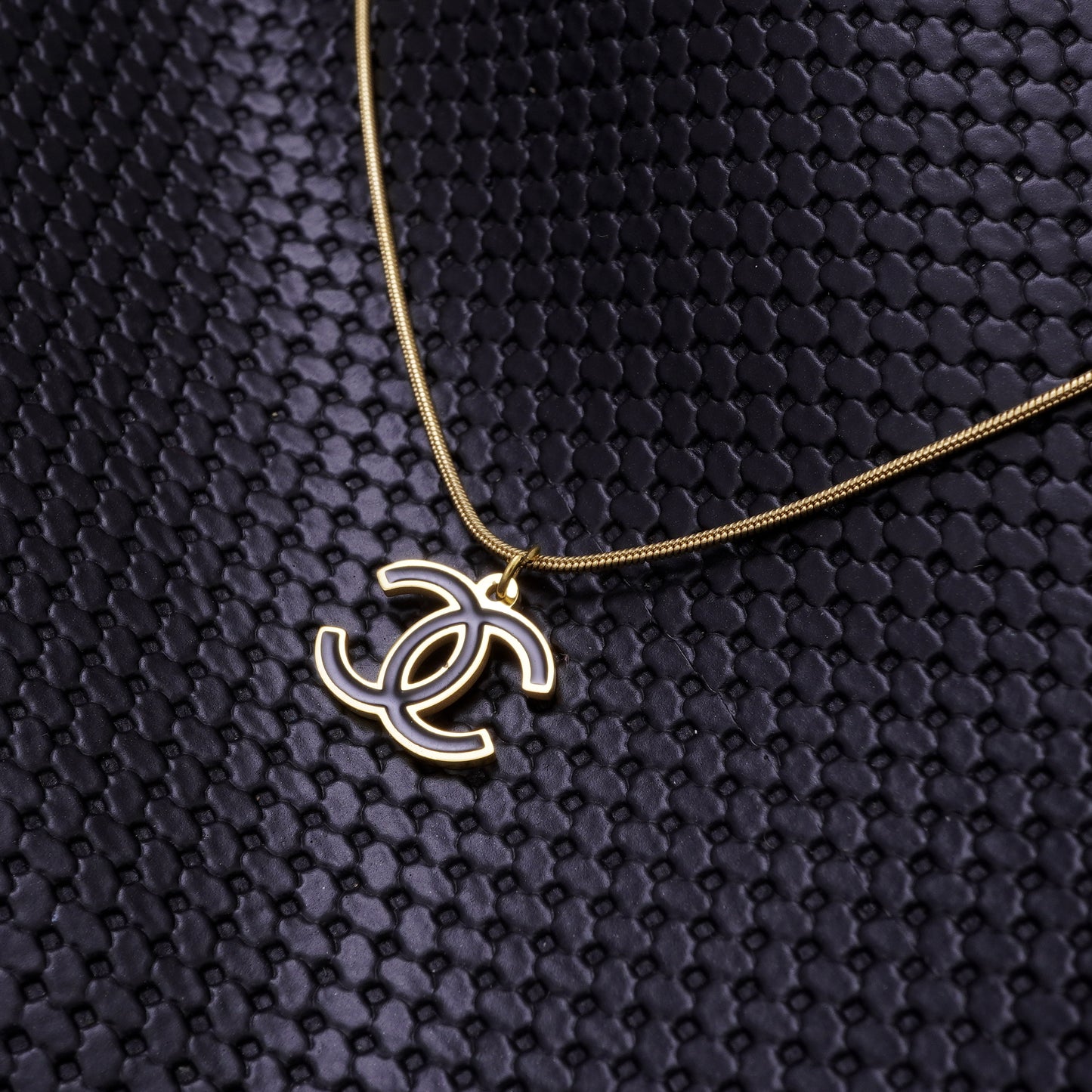 CROSS BLACK GOLD NECKLACE