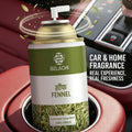 Belachi fennel car & home fragrance spray can in a car cup holder.