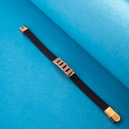 GOLD PLATED MORBIUS WITH DIAMOND IN BLACK SILICONE BRACELET