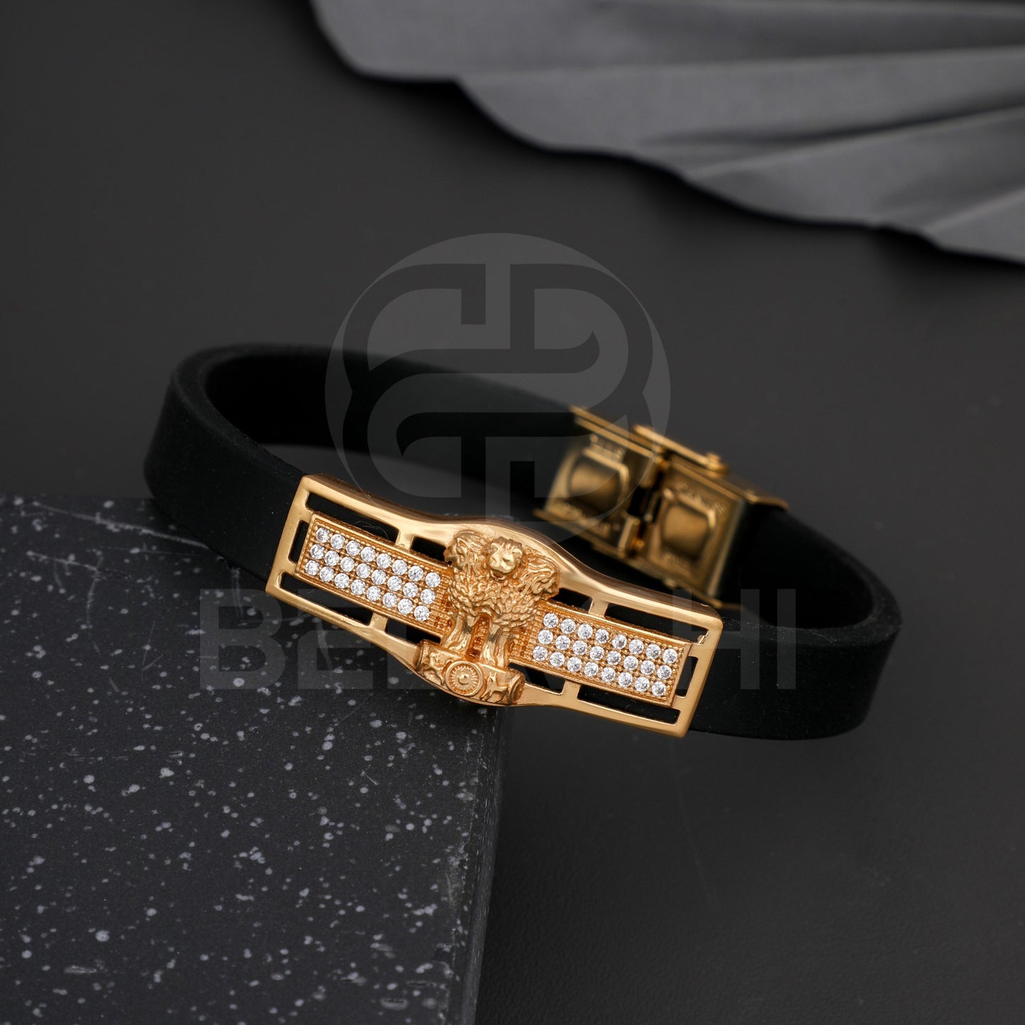 GOLD PLATED ASHOKA WITH DIAMOND IN BLACK SILICONE BRACELET