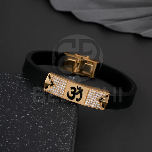 GOLD PLATED TRISHULA WITH DIAMOND IN BLACK SILICONE BRACELET